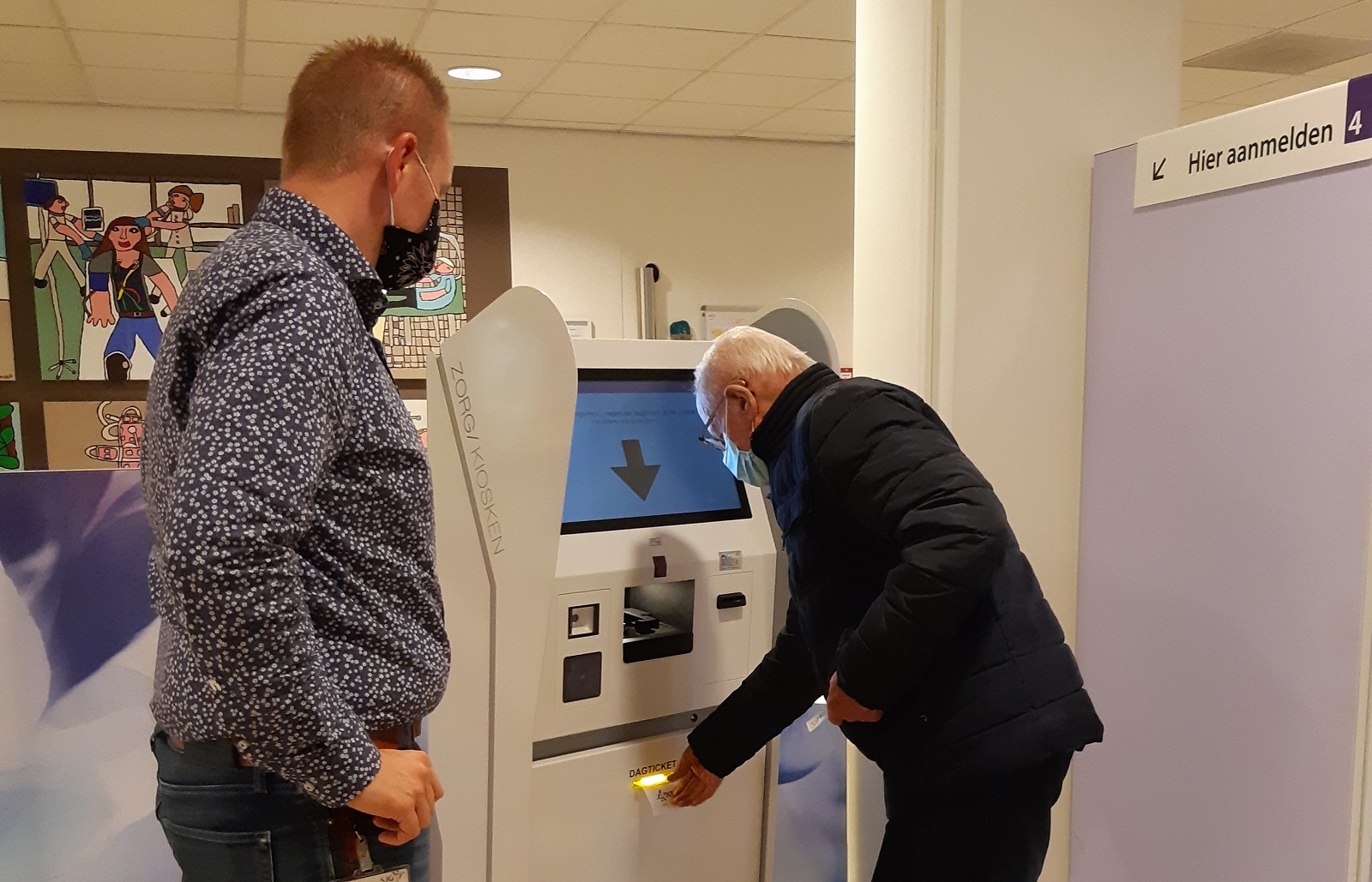 Patient checking in at a hospital kiosk